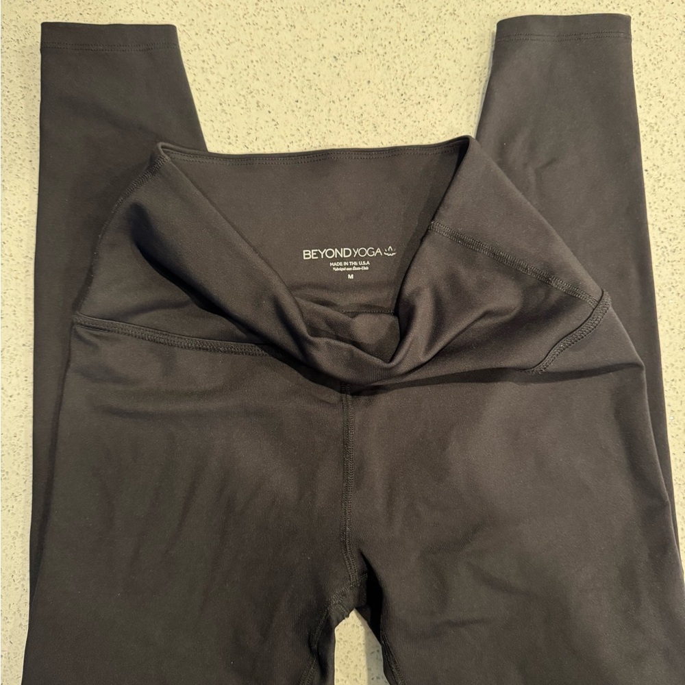 Beyond yoga, black leggings size medium, never worn